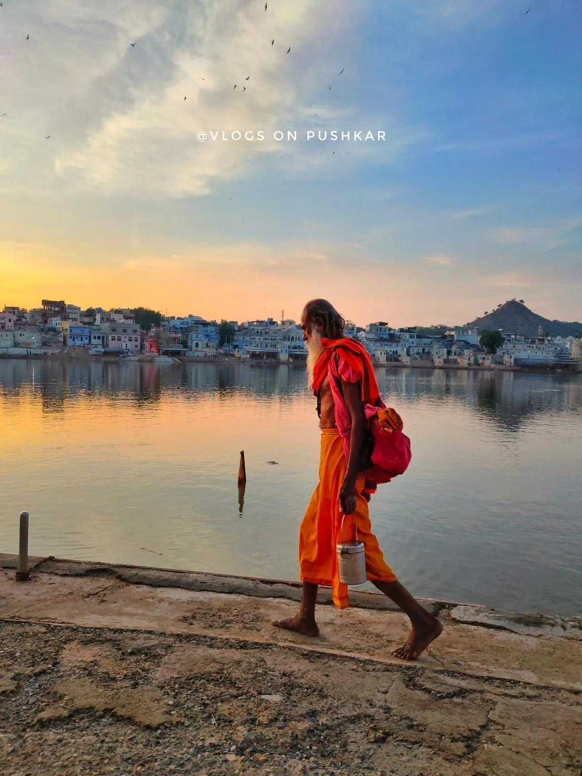 Devotees performing puja rituals at Pushkar Lake ghats